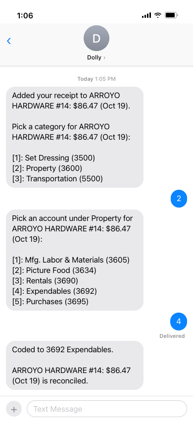A text conversation coding a charge: pick a category, then an account, then Dolly confirms the charge is reconciled.