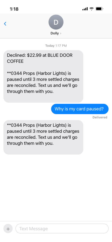 Dolly texts that a coffee purchase was declined because the card is paused until 3 more charges are reconciled.